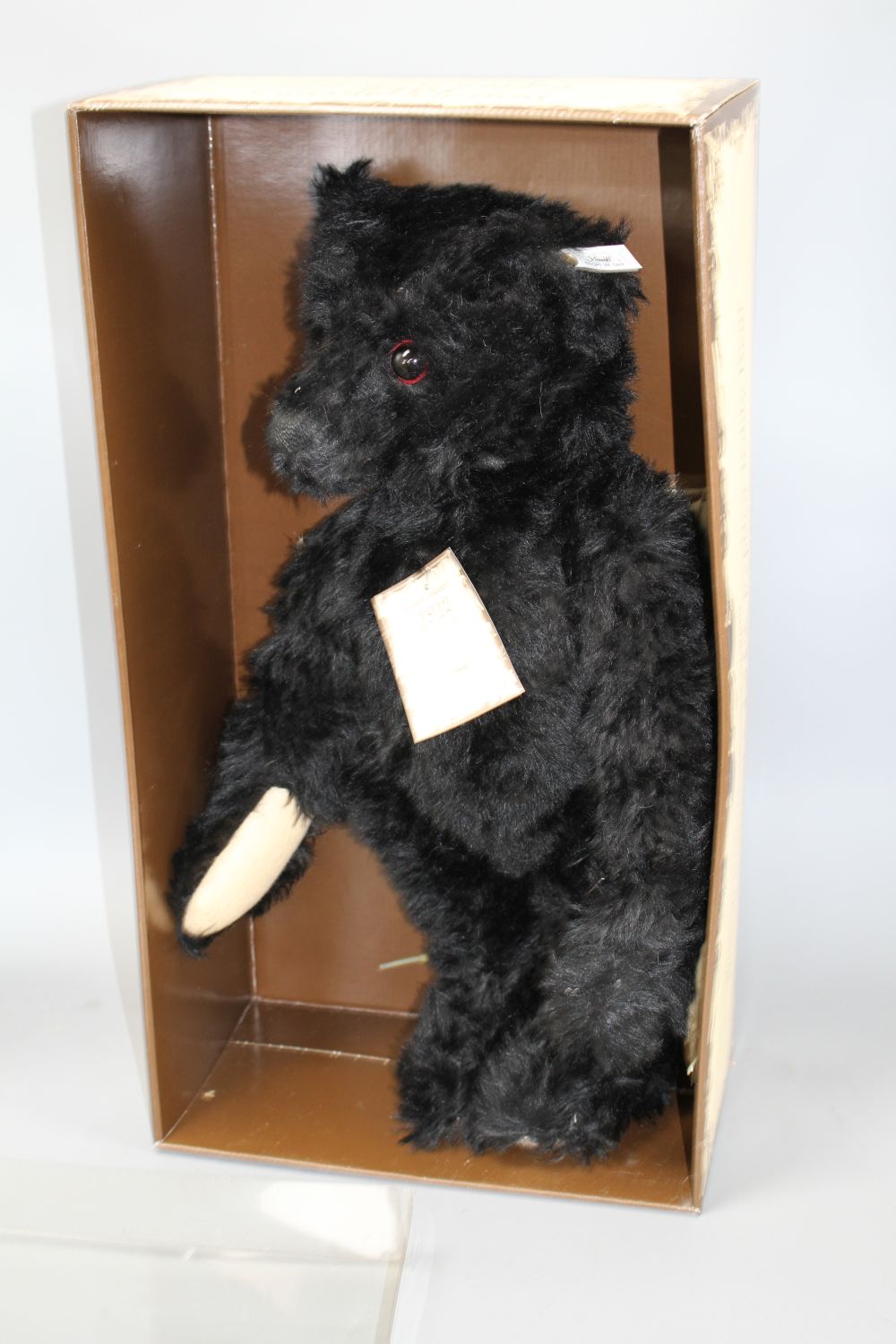 Four Steiff boxed limited edition teddy bears: a 1912 Replica, a 1906 Replica, Petsy 1927 and Snap-A-Part-Teddy bear 1908